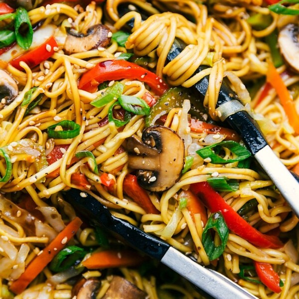 Finished chow mein noodles coated in delicious sauce with vegetables mixed throughout.