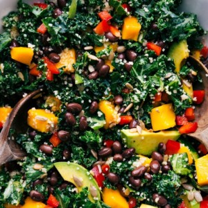 Ready-to-eat kale couscous salad, freshly dressed and garnished.