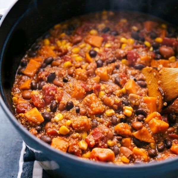 Quinoa chili in a pot, warm and ready to be served, offering a hearty and delicious meal with a healthy twist.