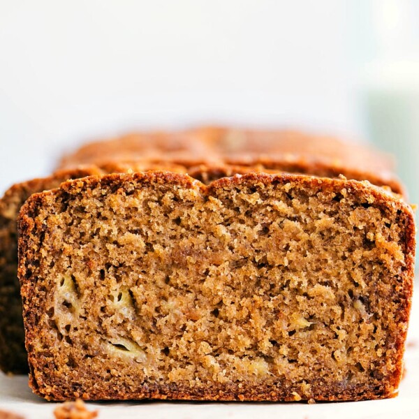 A slice of warm, healthy banana bread ready to be enjoyed.