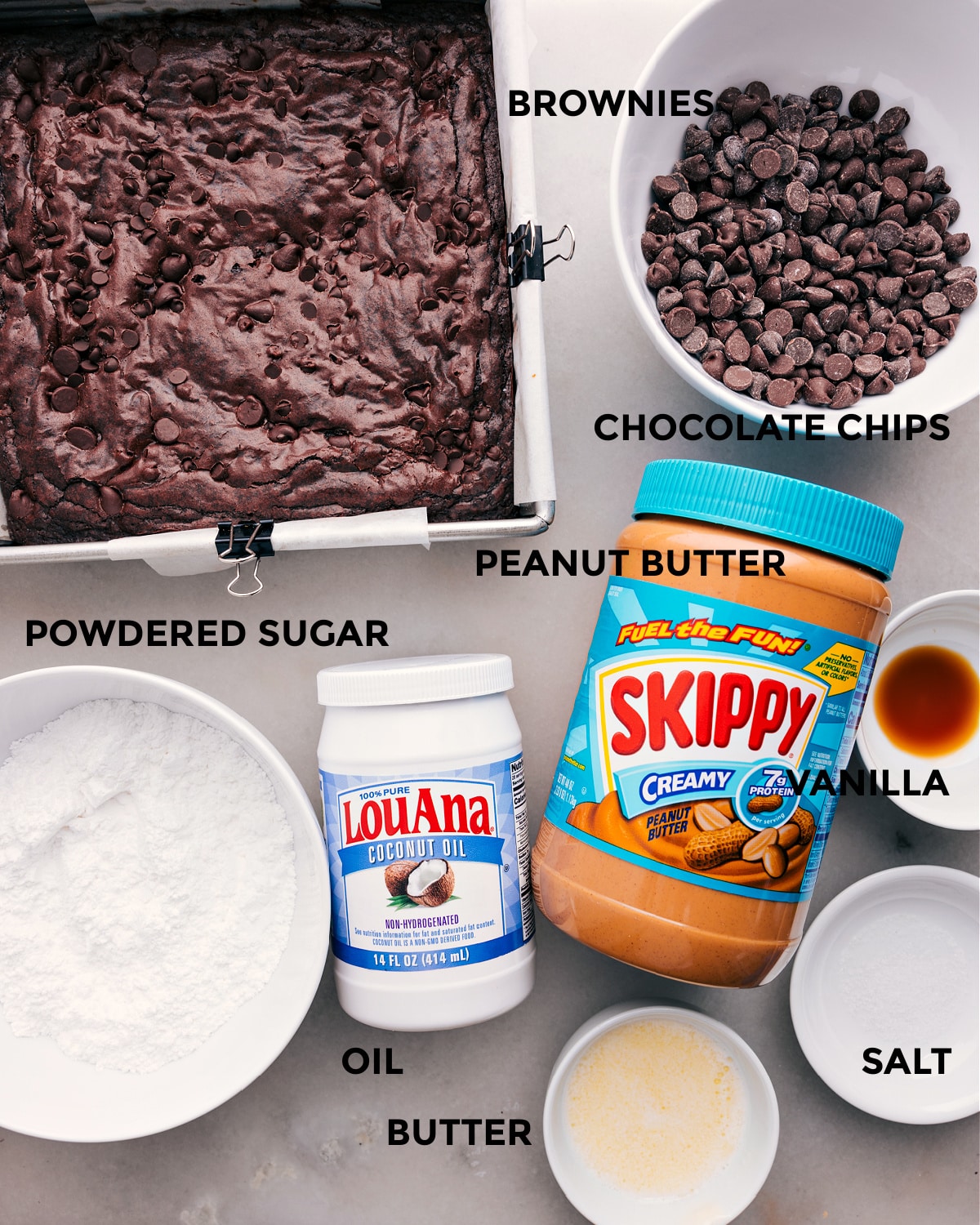 This recipe includes a base, chocolate chips, peanut butter, sugar, vanilla, oil, and butter.