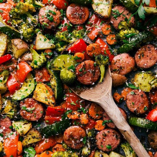 A tray featuring the perfectly cooked and seasoned one pan Italian sausage and veggies recipe, where all the flavors come together to create the perfect combination of flavor and texture.