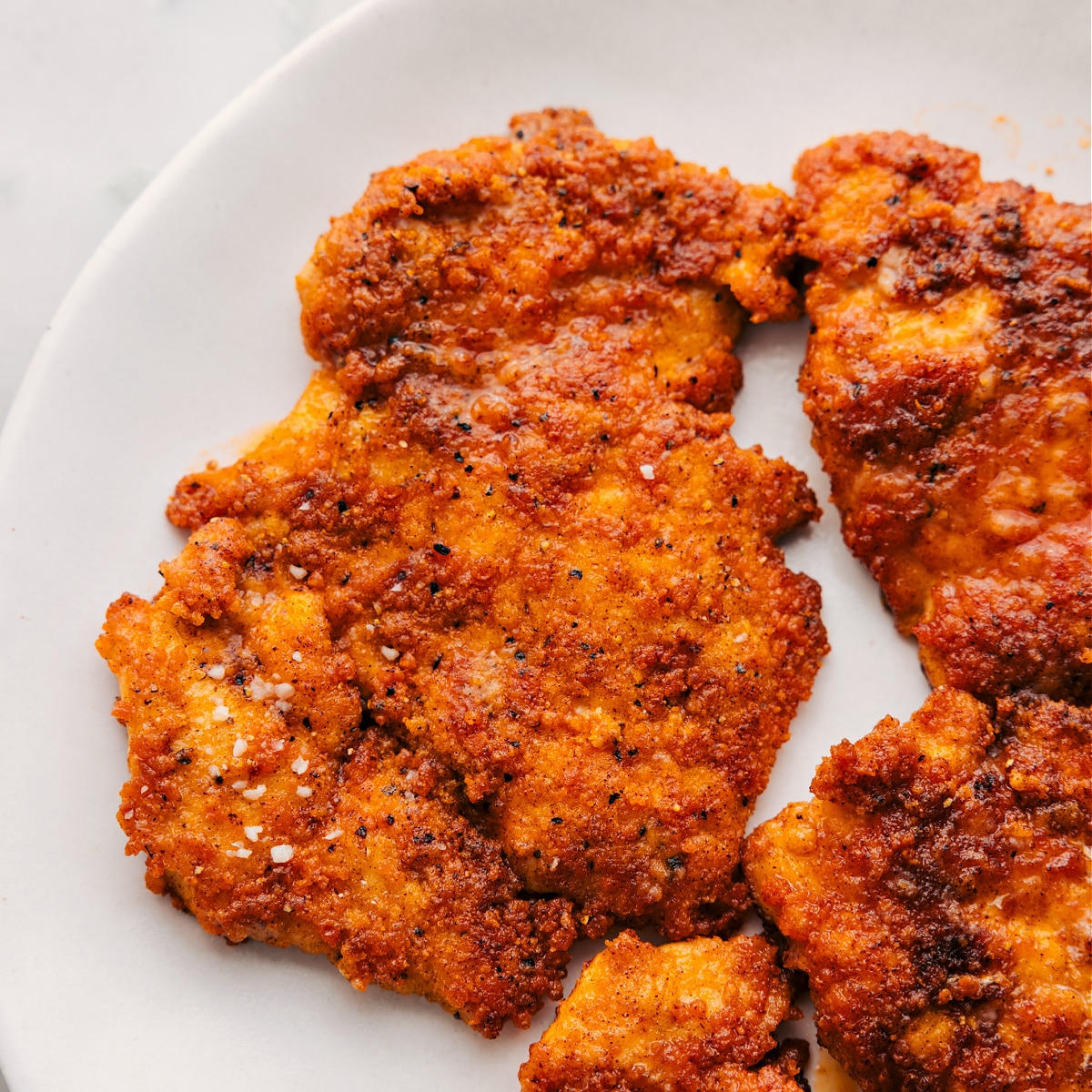 Fry the meat until it's cooked through and ready to be added back to the dish.