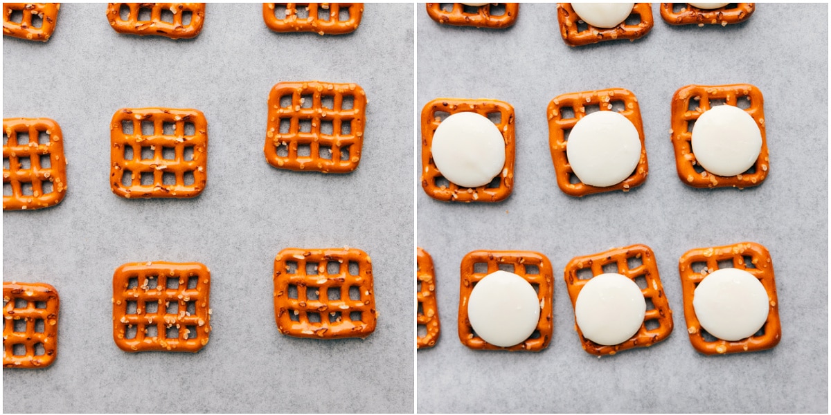 Pretzels laid out on a sheet pan and white chocolate wafers placed on top to go in the oven.