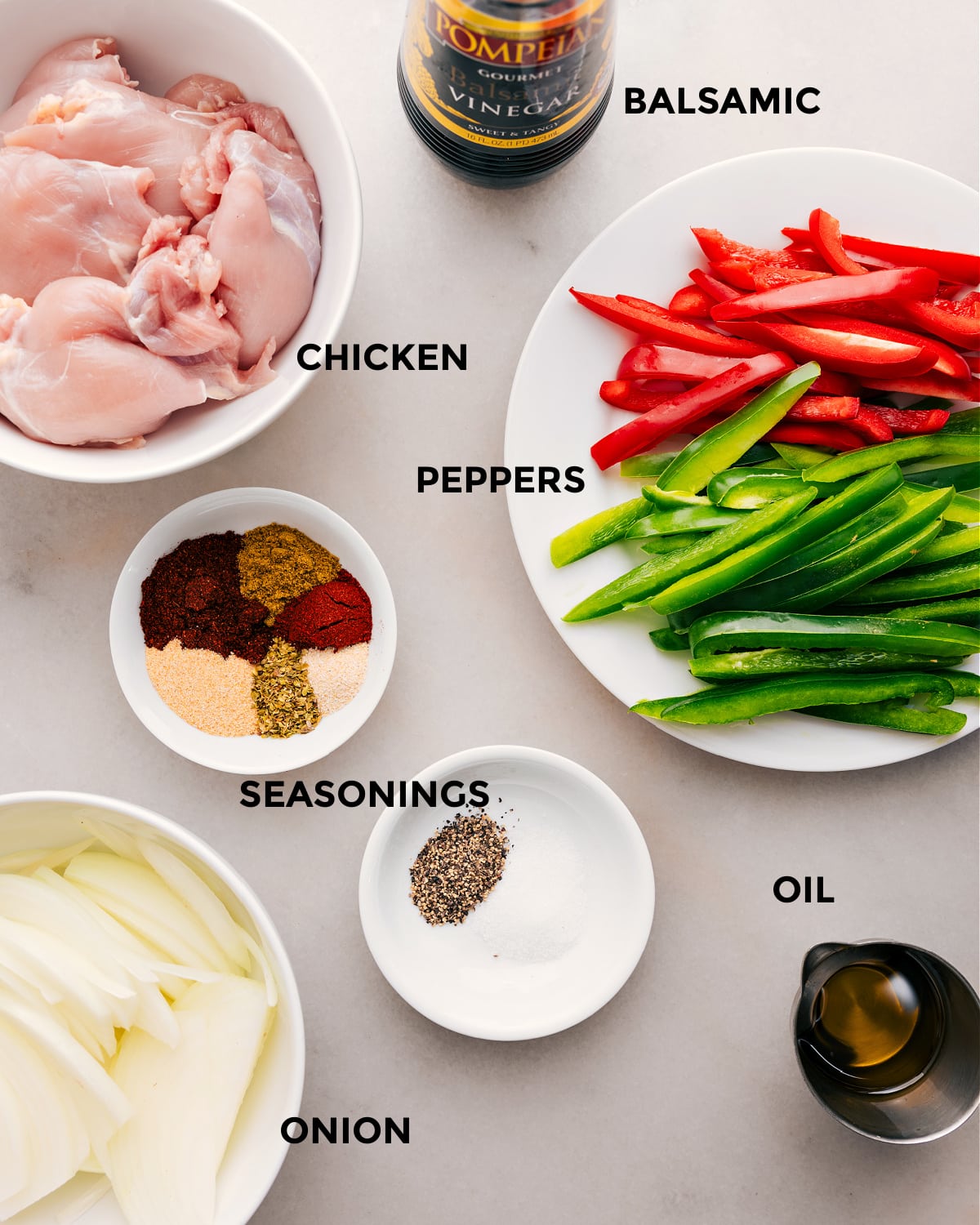 Prep all the ingredients in this recipe for easy assembly, including the meat, peppers, seasonings, balsamic, oil, and onions.