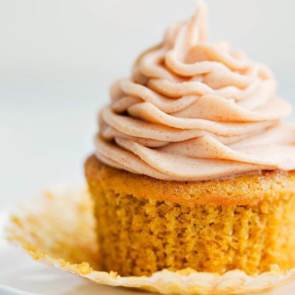 Ready to eat delicious pumpkin cupcake with a cinnamon cream cheese frosting.