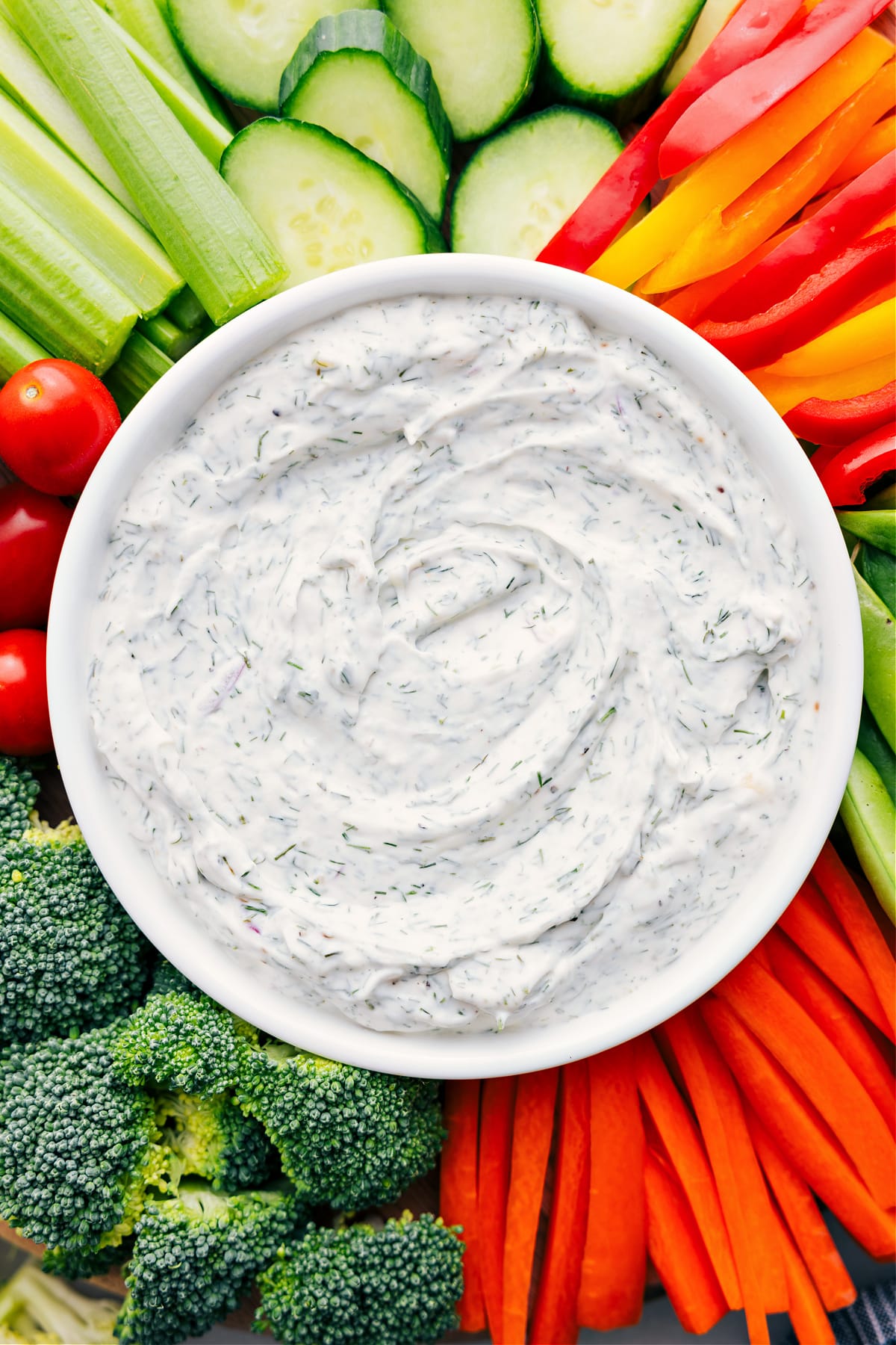 Veggie Dip in a bowl surrounded by fresh veggies, ready for dipping and enjoying!