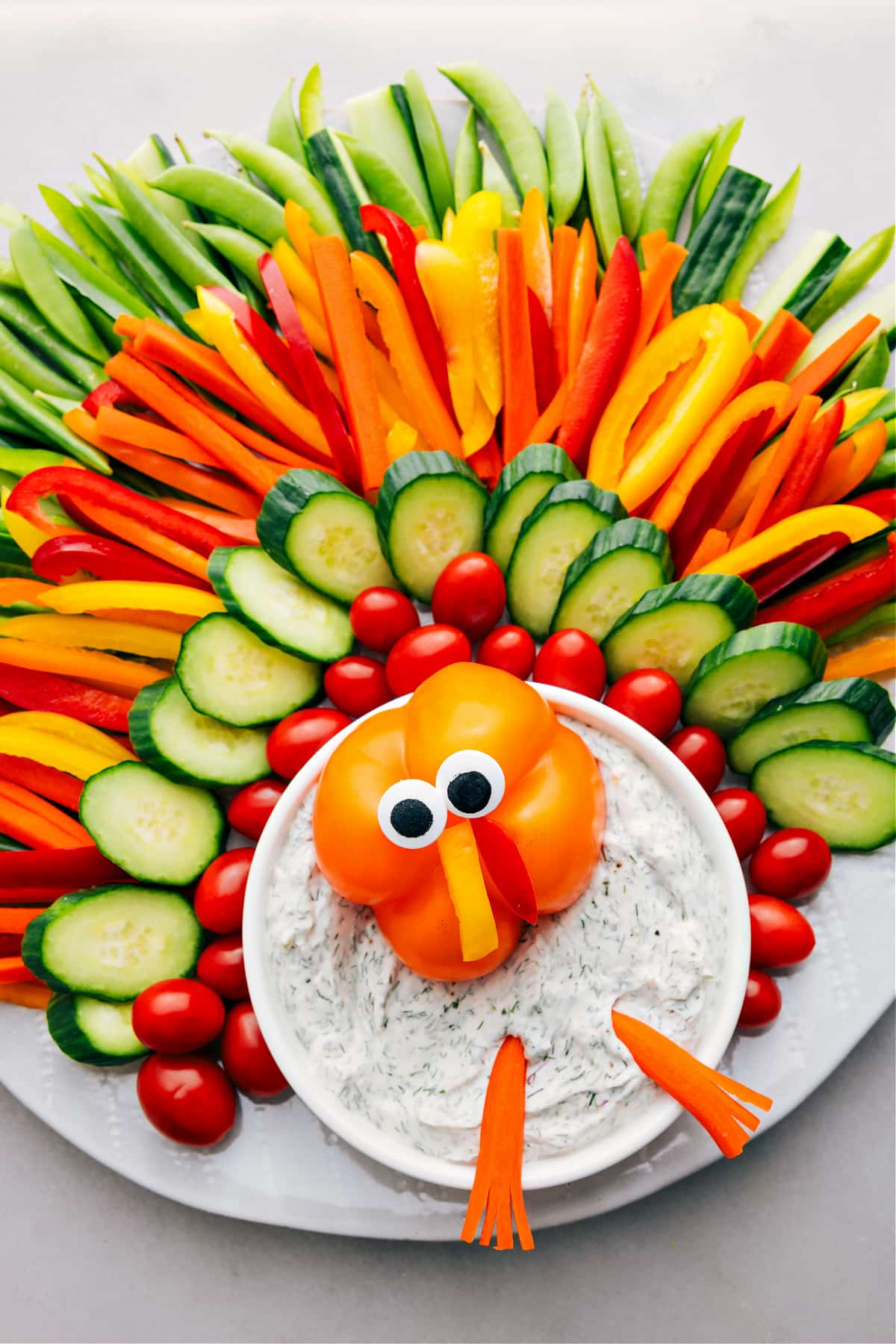 Vegetables arranged to look like a turkey make a fun Thanksgiving appetizer option.