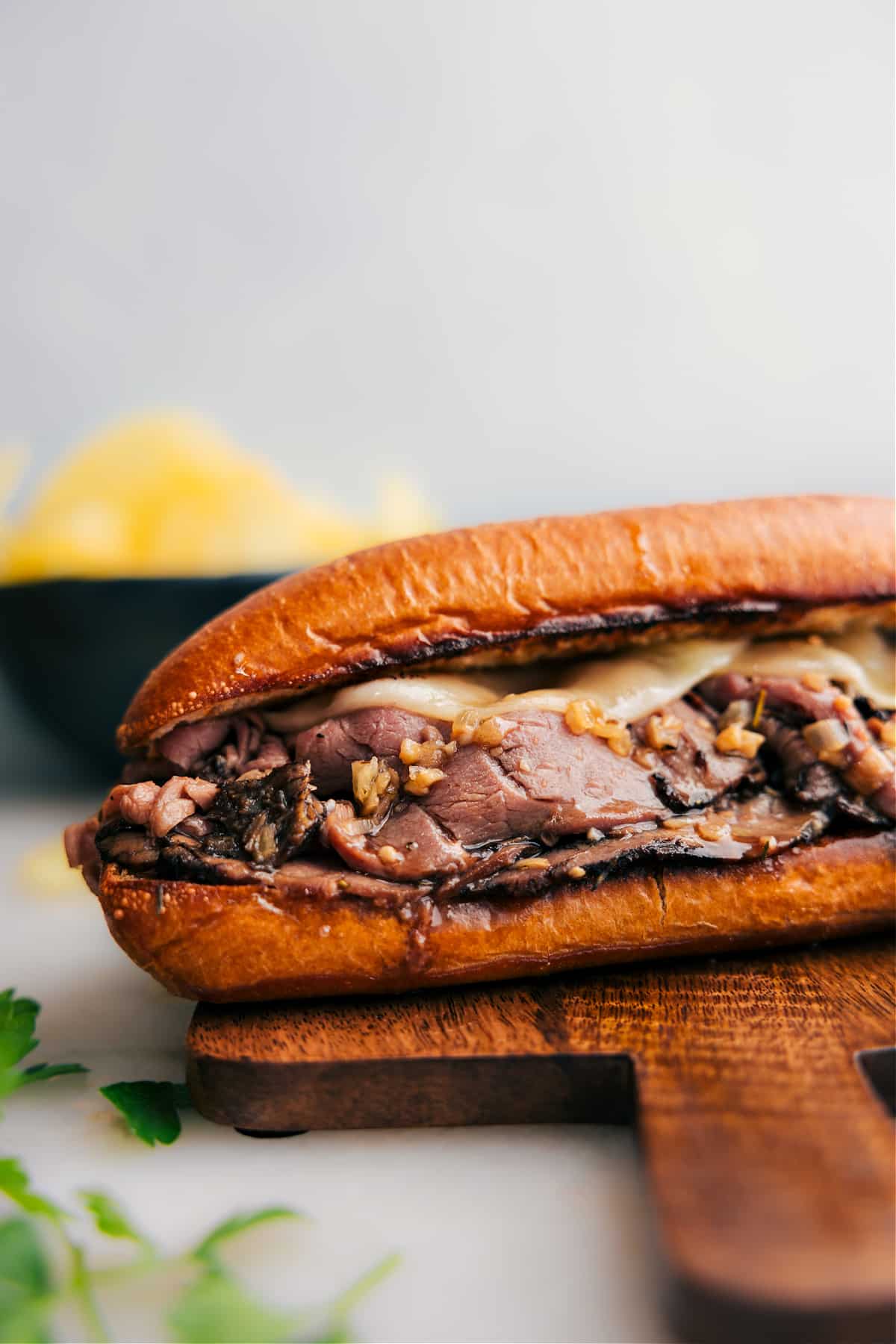 A French dip sandwich fresh out of the oven ready to be enjoyed.