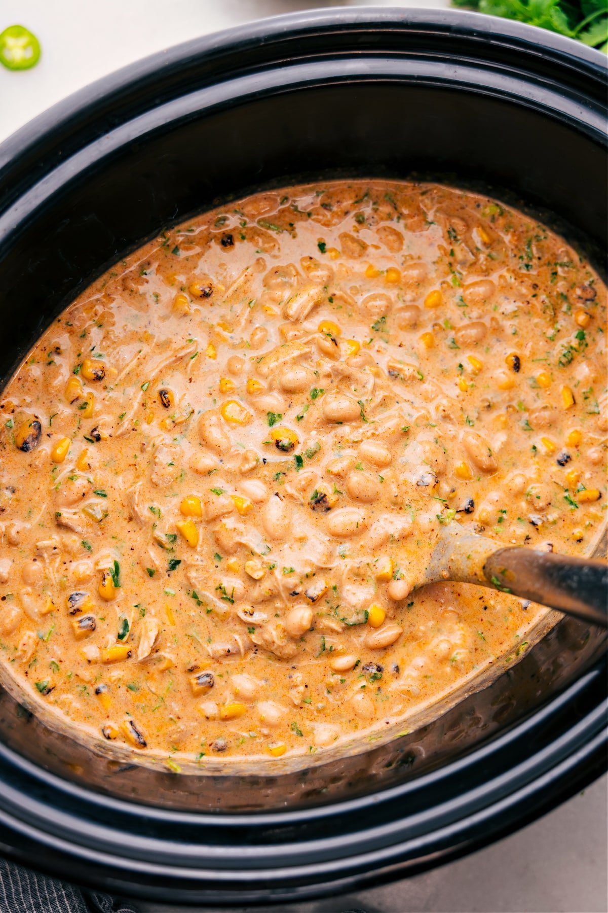 Crockpot White Chicken Chili cooks in the slow cooker.