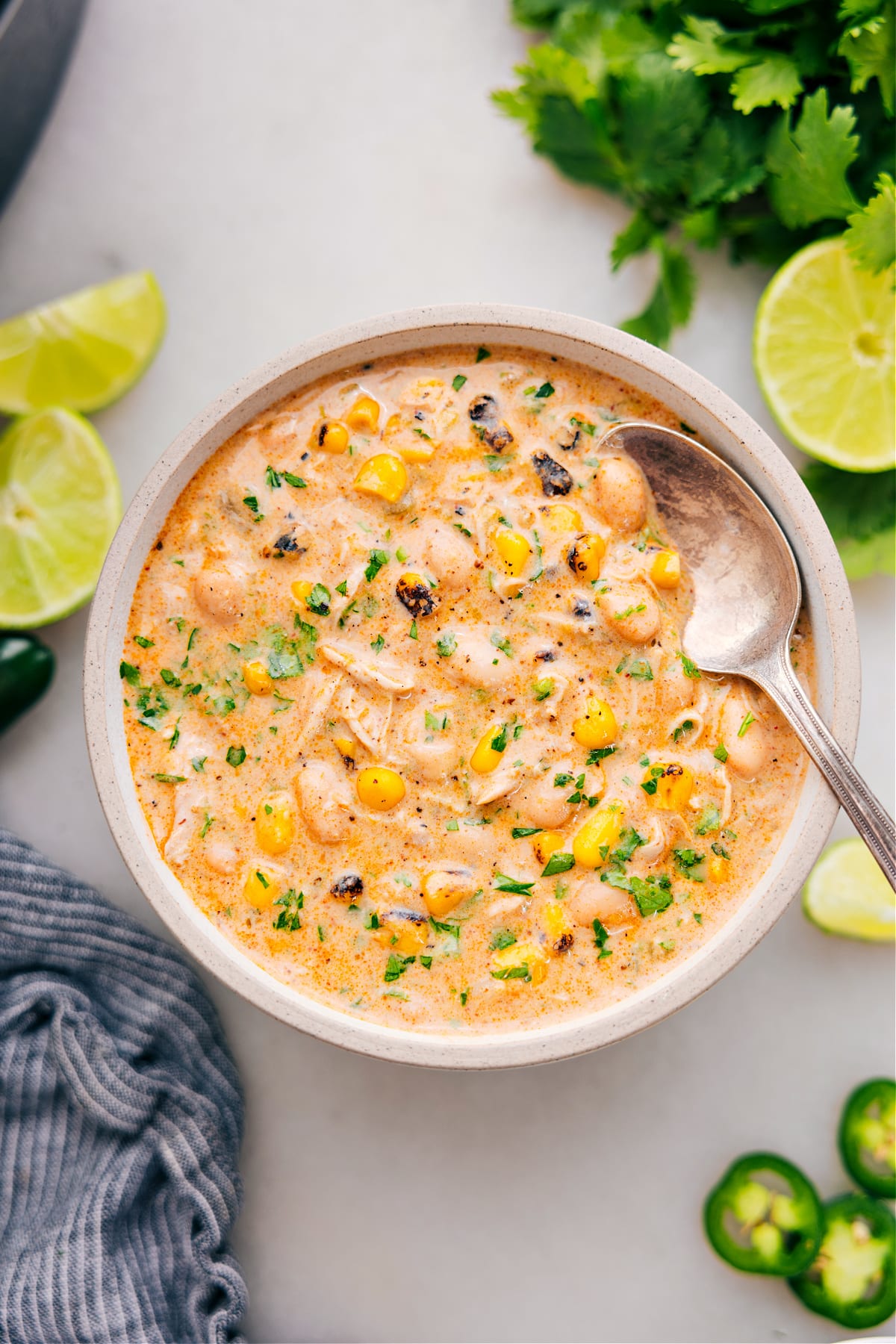 Serve the crockpot white chicken chili in a bowl, ready to enjoy.