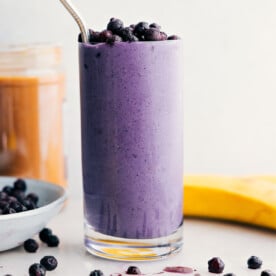 The best blueberry smoothie recipe blended up and served in a cup for the ultimate, refreshing breakfast.