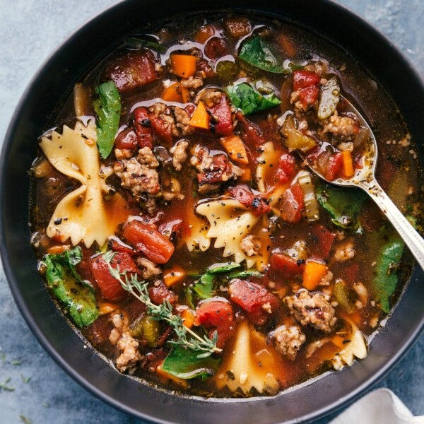 Pasta soup in a bowl, warm and veggie packed ready to be eaten.