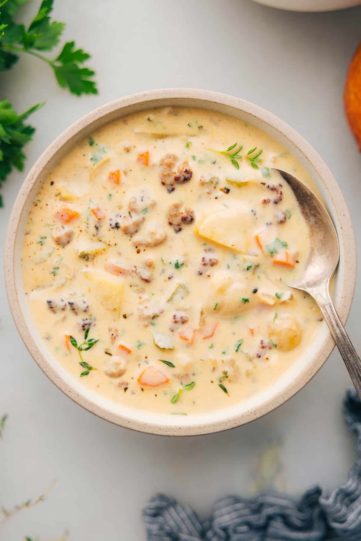 Sausage potato soup in a bowl ready to serve.