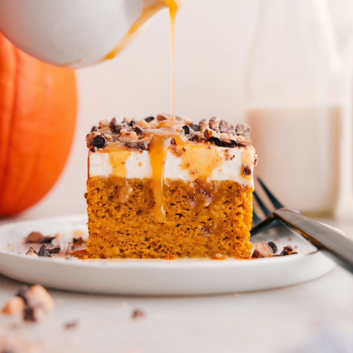 Drizzle caramel over the pumpkin poke cake.