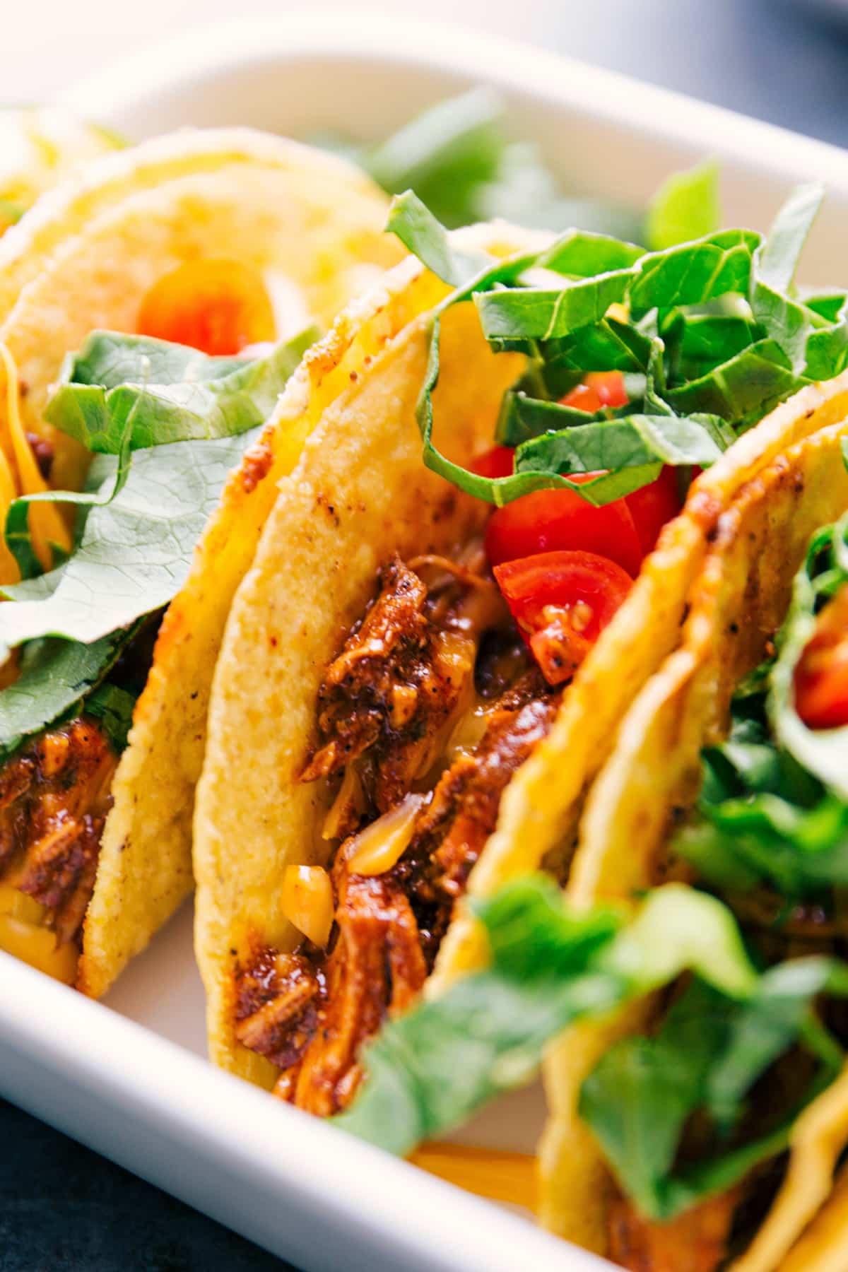 Rotisserie Chicken Tacos fill the casserole dish, ready for all the yummy topping options.