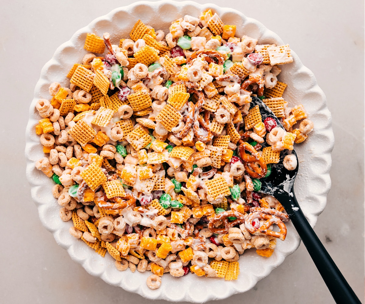 Christmas Snack Mix tossed together in a bowl, ready to enjoy!