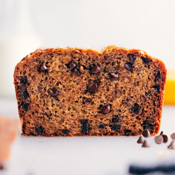 A perfectly baked loaf, cut open to reveal the fluffy and delicious interior with chocolate chips.