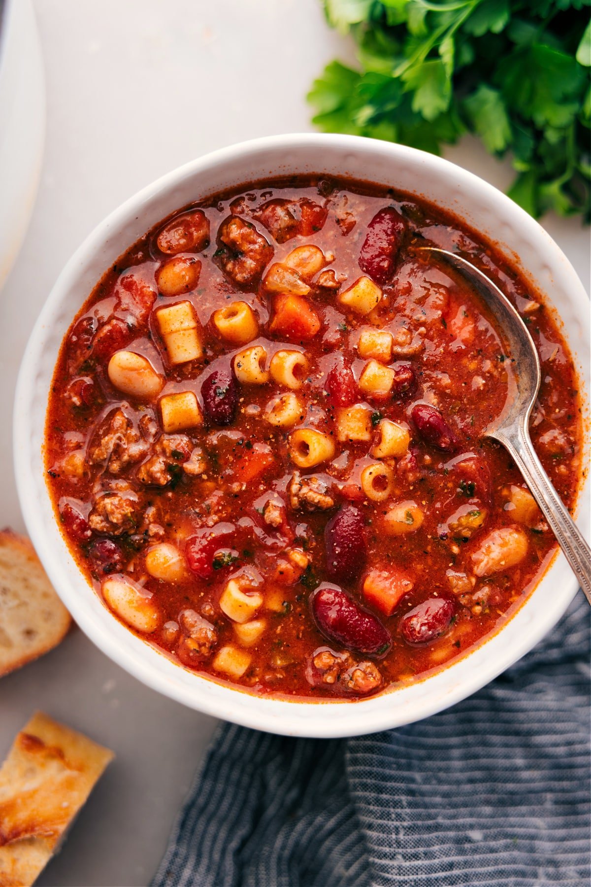 A bowl of Pasta e Fagioli is ready to enjoy.