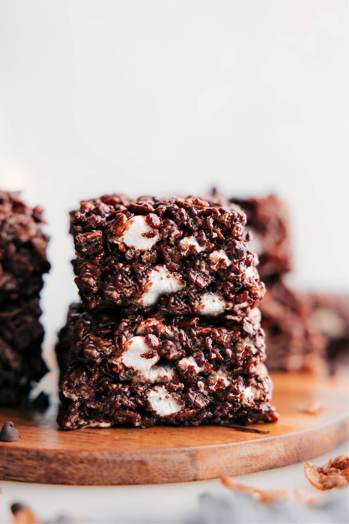 The dessert cut into squares and stacked on top of each other to enjoy.