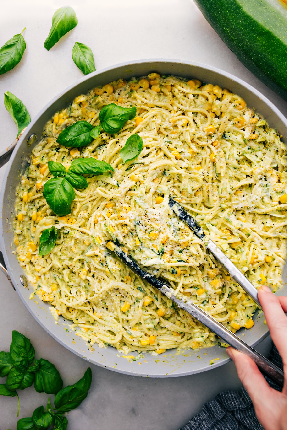 Zucchini Pasta Sauce over spaghetti in a pot ready to be served for dinner.