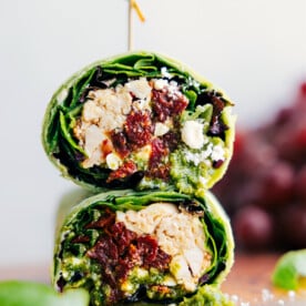 Mediterranean Wrap cut in half and stacked on top of each other.