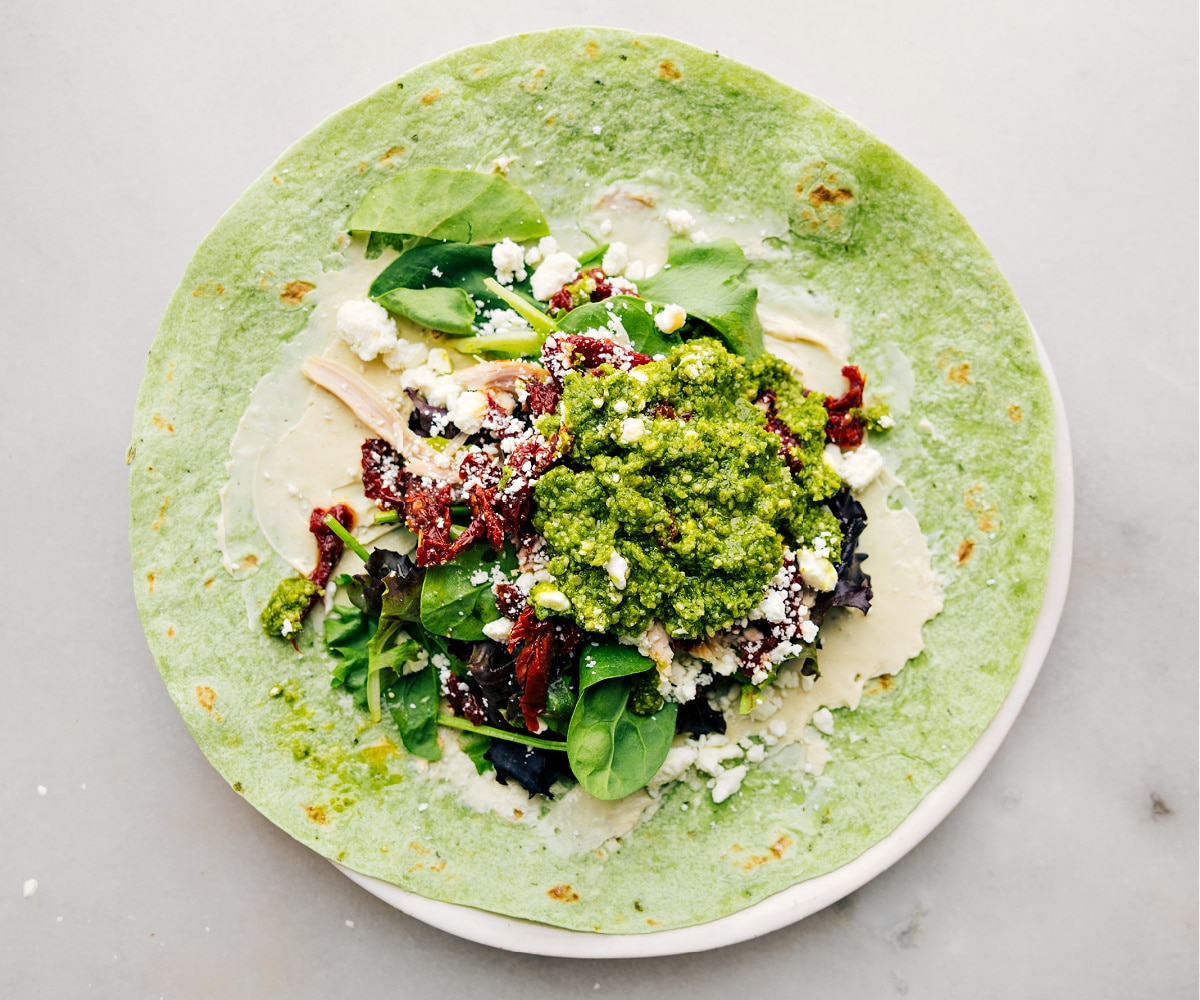 All the ingredients in these Mediterranean Wraps assembled inside a tortilla.