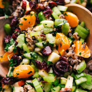 Wild rice pilaf baked with fresh vegetables and herbs, bursting with flavor and wholesome ingredients.