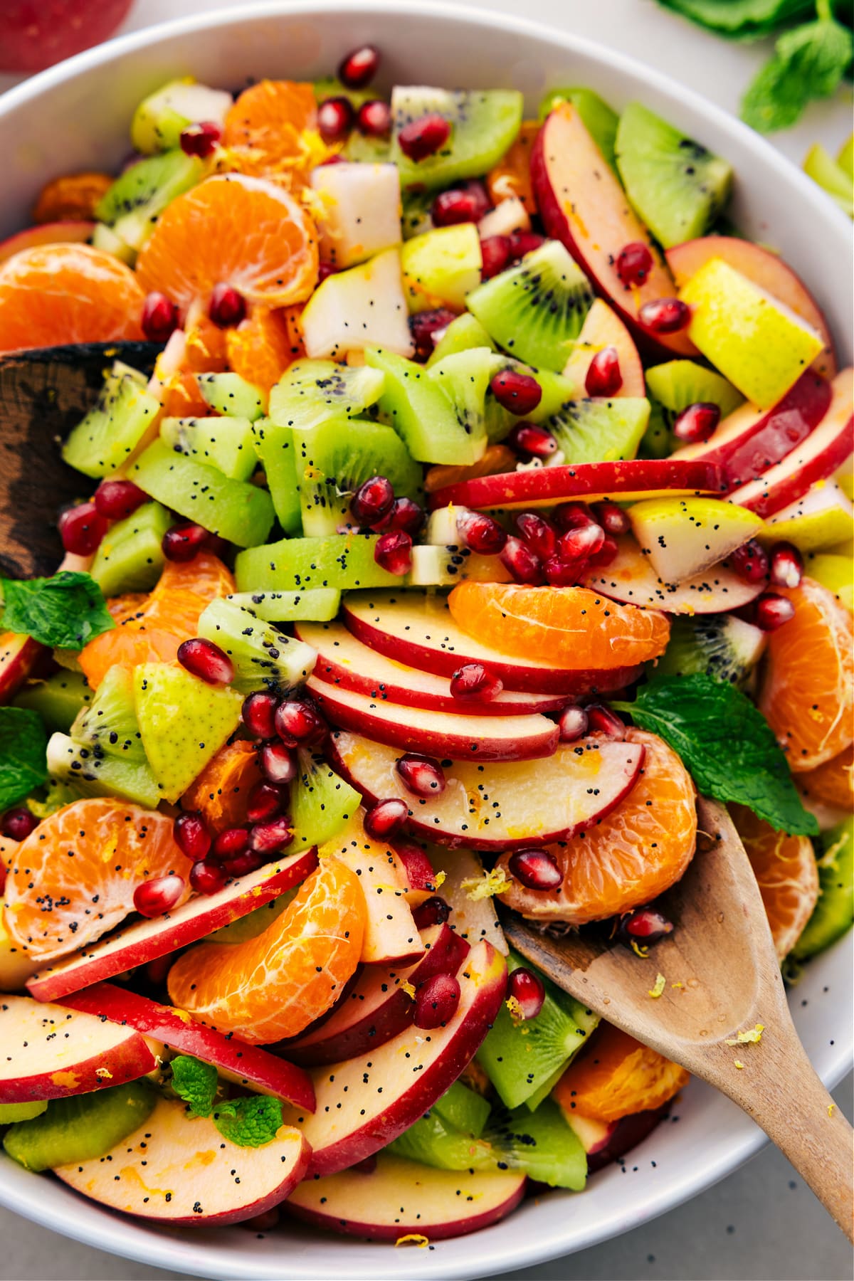 Winter fruit salad in a bowl, dressed and ready to enjoy.