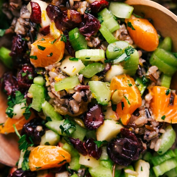 The finished wild rice pilaf recipe with cranberries and orange, fresh herbs, and abundant flavor.