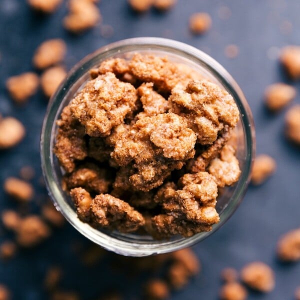 Candied walnuts in a cup, perfectly golden and packed with flavor, ready to be enjoyed.