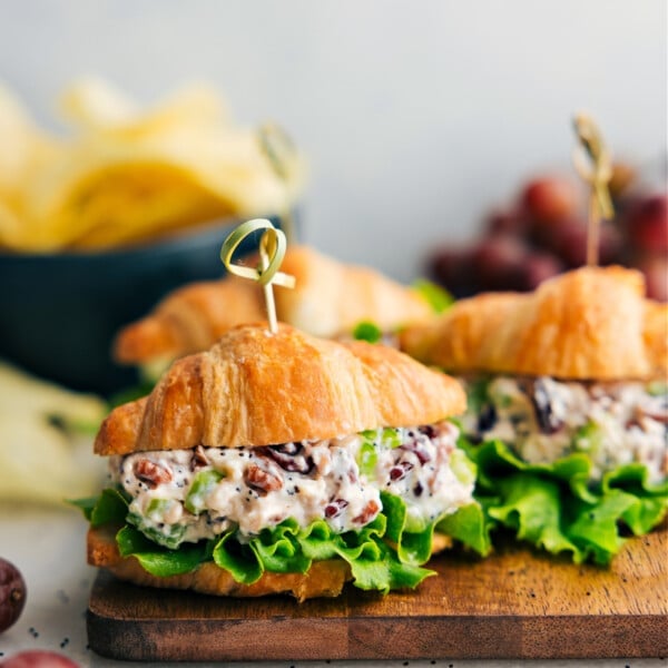 Chicken Salad recipe assembled in a croissant with lettuce.