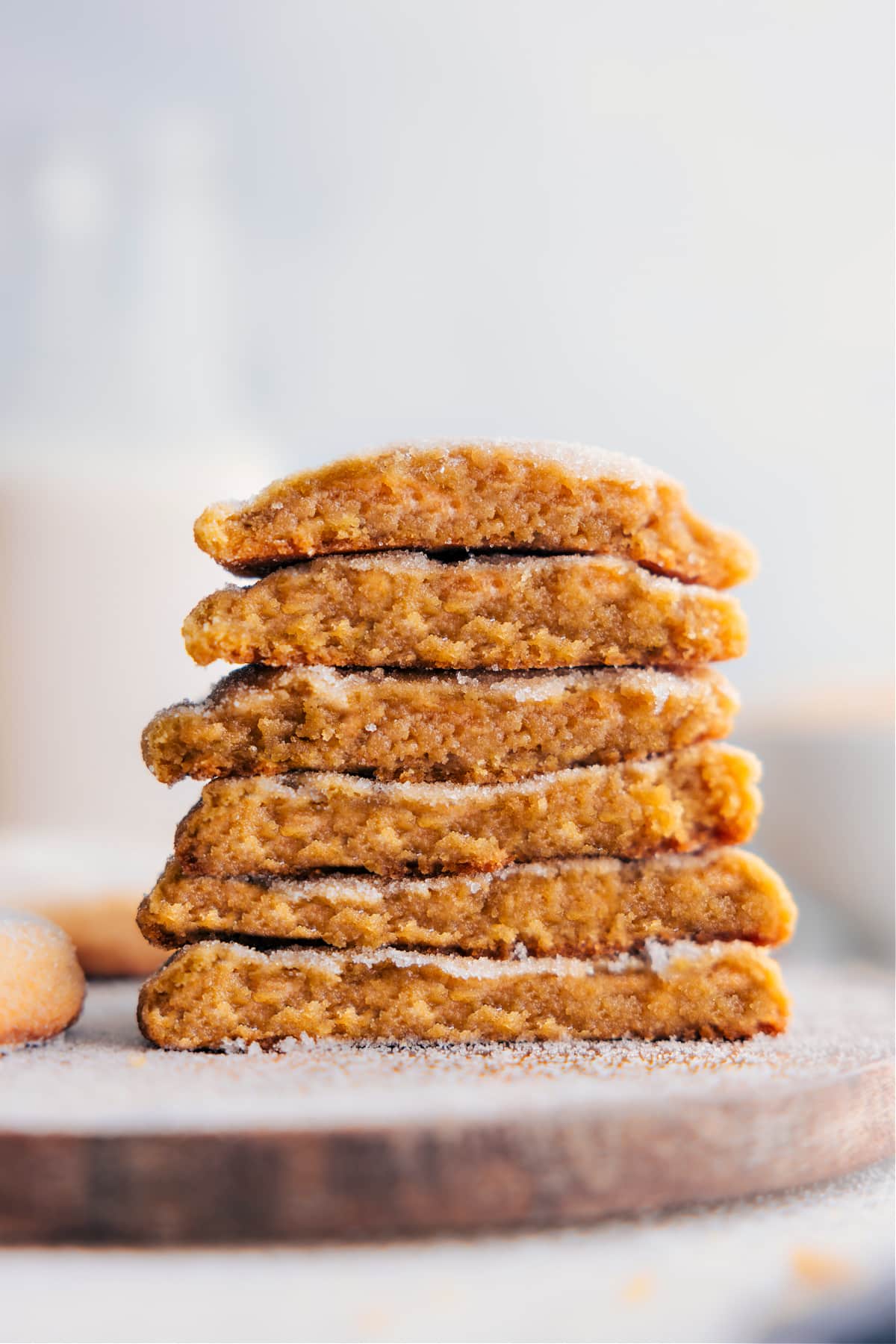 The Brown Sugar Cookies stacked on top of each other broken in half ready to be enjoyed.