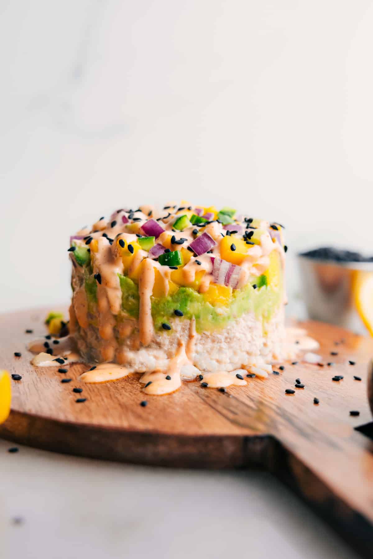 Enjoy this Tuna Stack drizzled with creamy sriracha mayo.