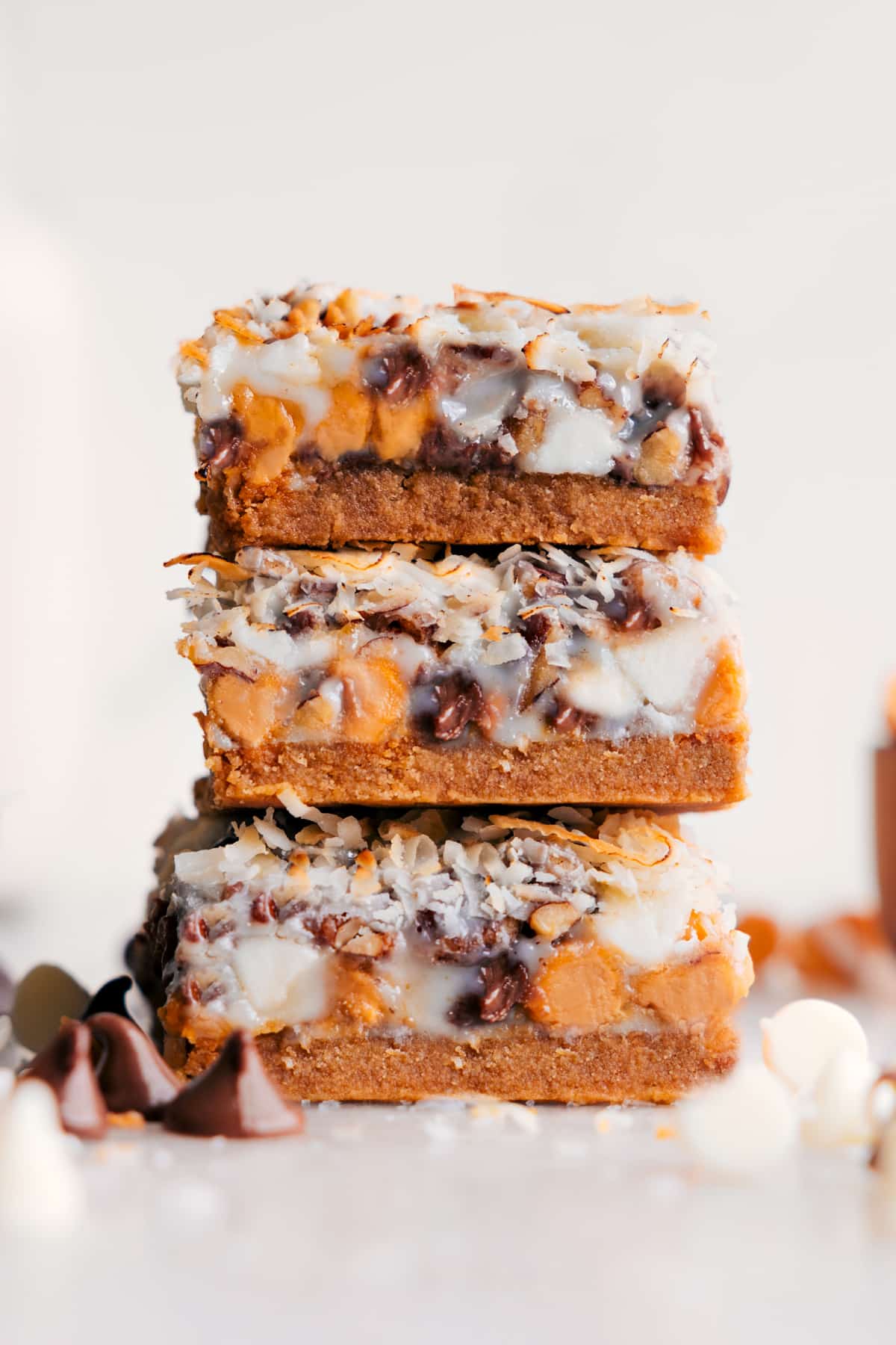 7 Layer Bars stacked to reveal all the yummy layers.