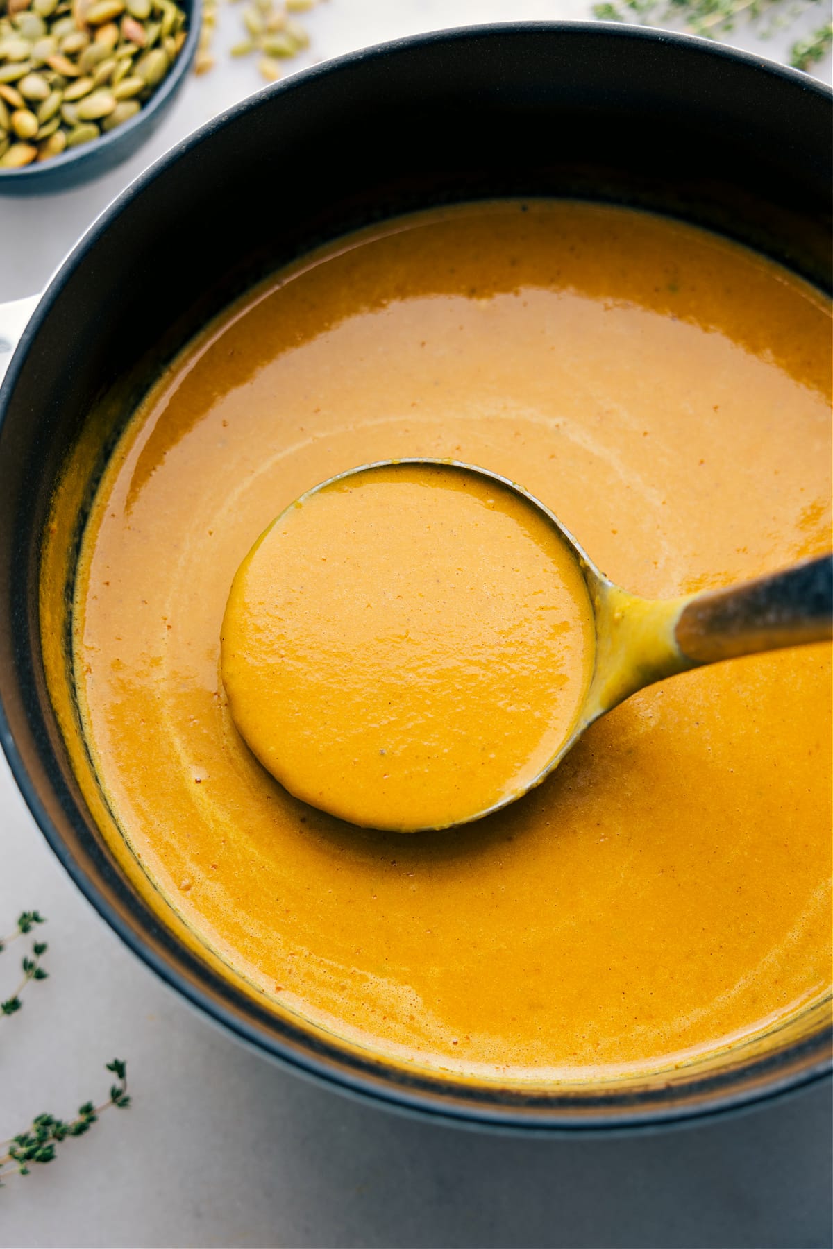 Serve a big scoop of pumpkin soup from the pot for a delicious one-pot weeknight dinner.