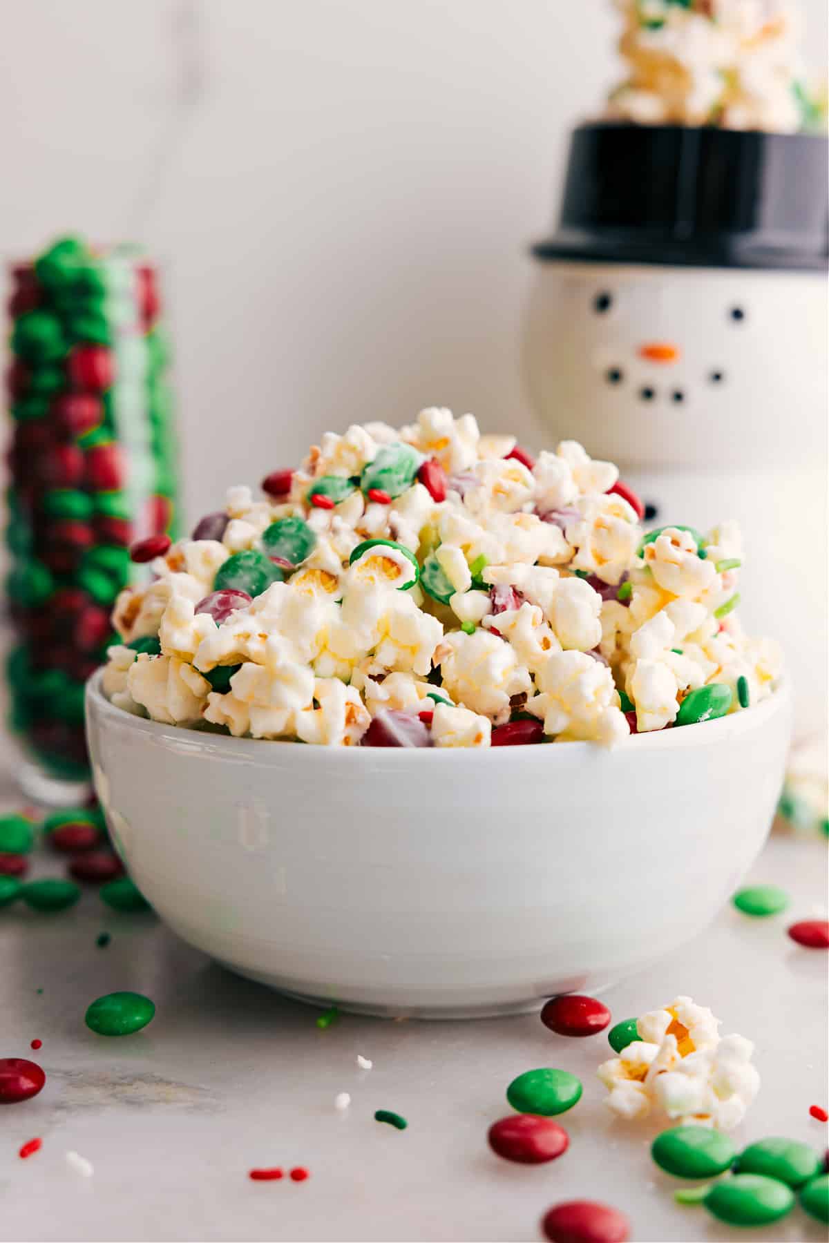 A big bowl of Christmas popcorn, perfect for a cozy movie night.