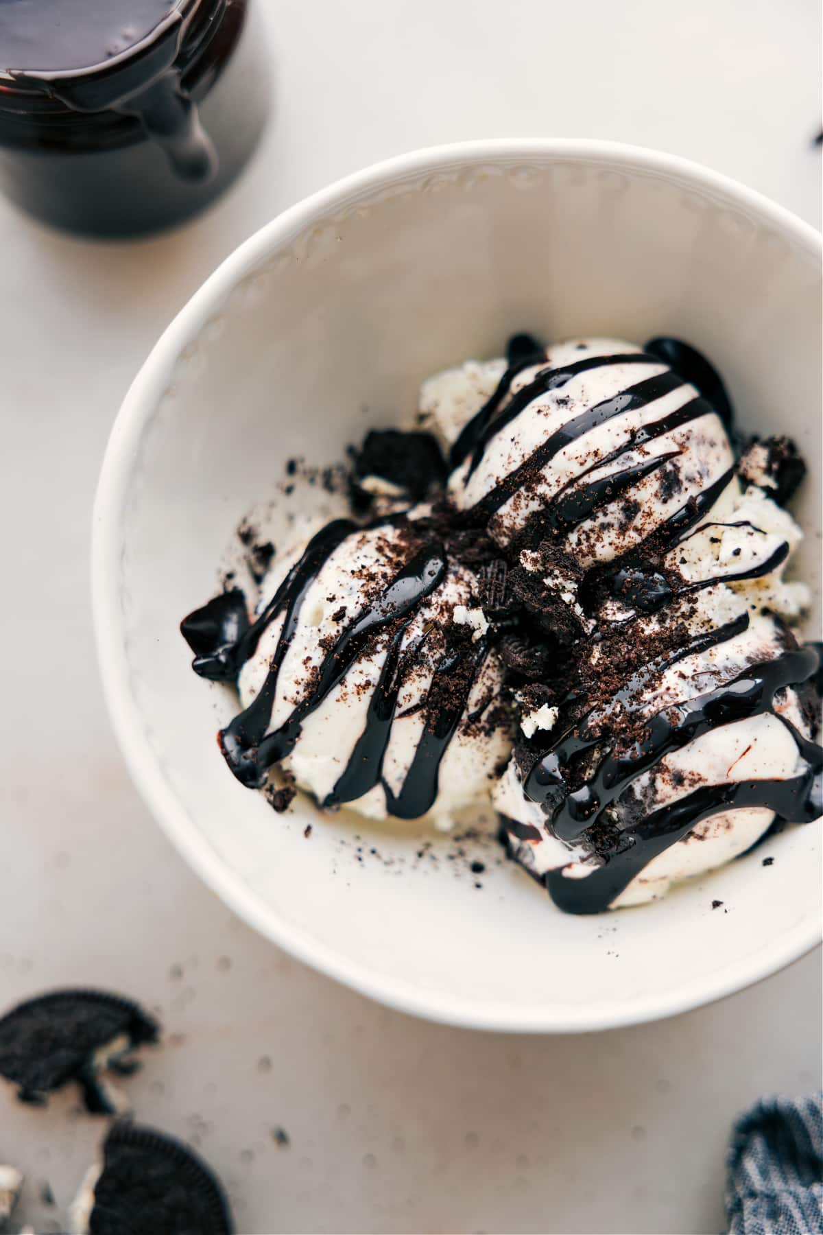 Hot Fudge Sauce drizzles over ice cream.