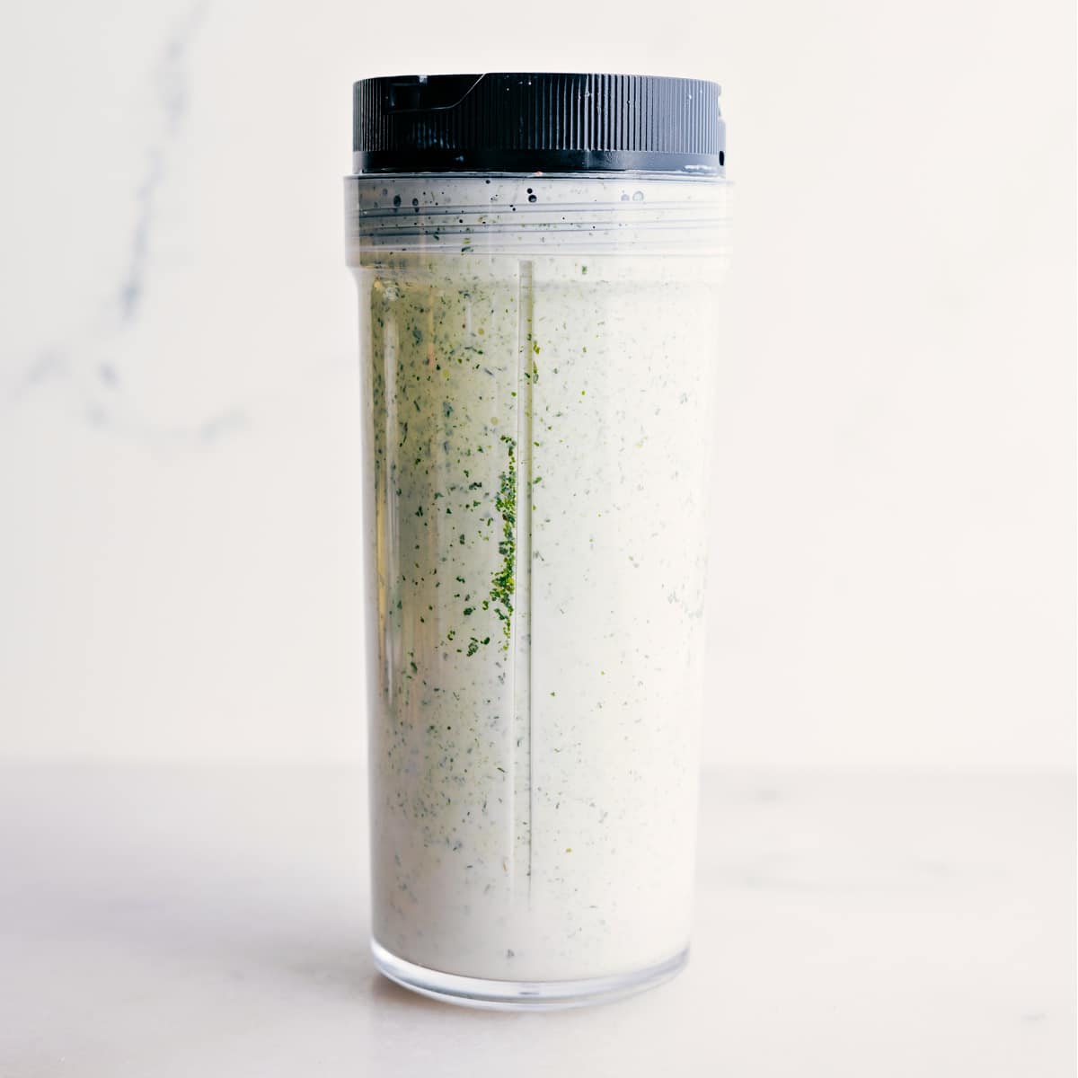 The dressing is blended in a blender jar.