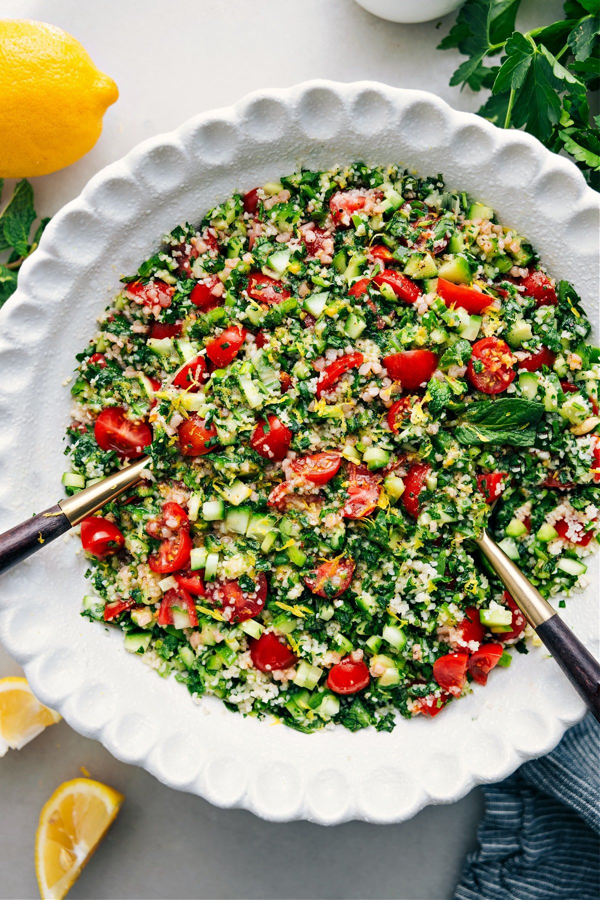 Tabouli in a bowl, tossed with dressing and ready to enjoy.