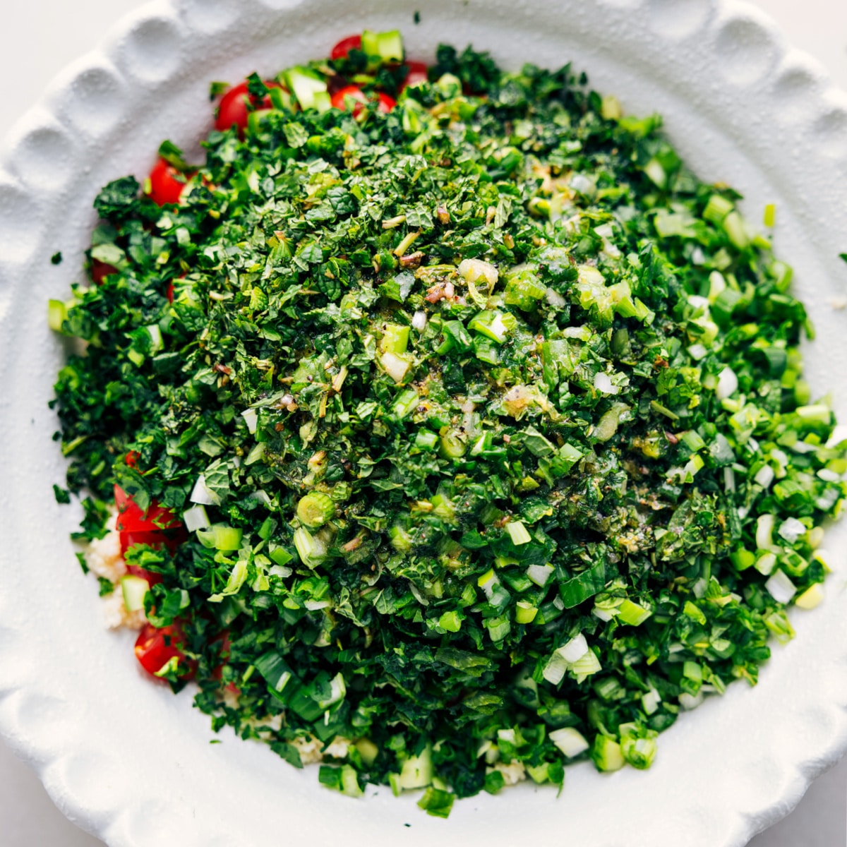 All the ingredients in a bowl, ready to mix and toss with the dressing.
