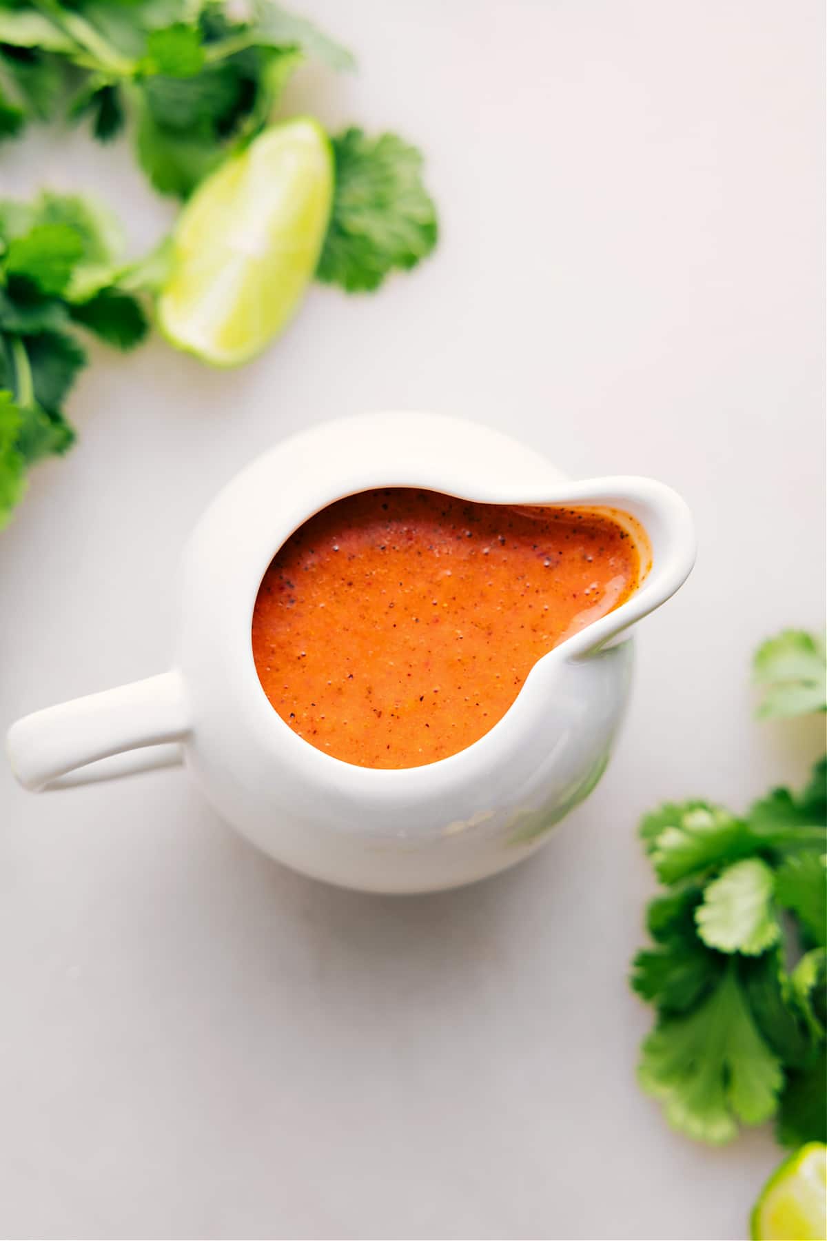 Jar filled with Chipotle Vinaigrette dressing.