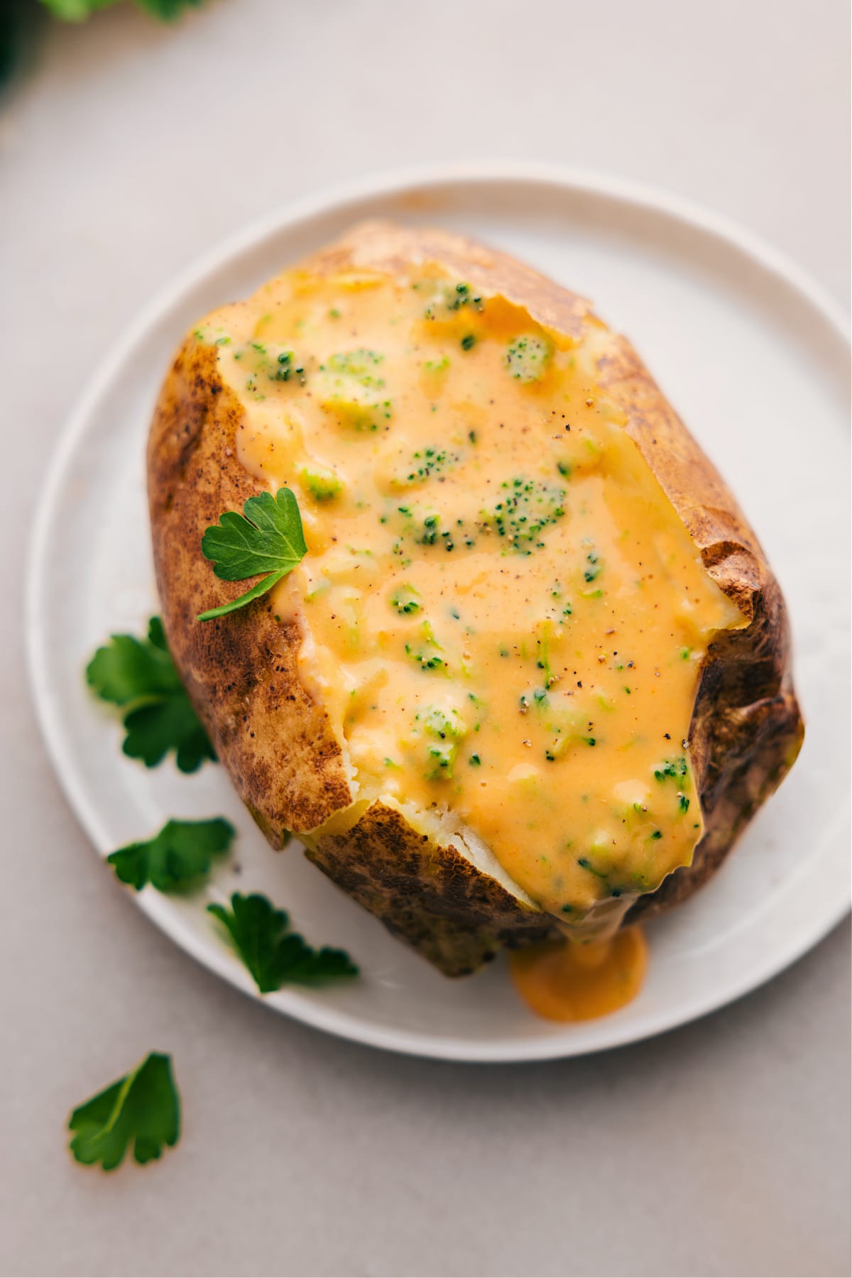 Serve Broccoli and Cheese Baked Potatoes on a plate, ready to enjoy.