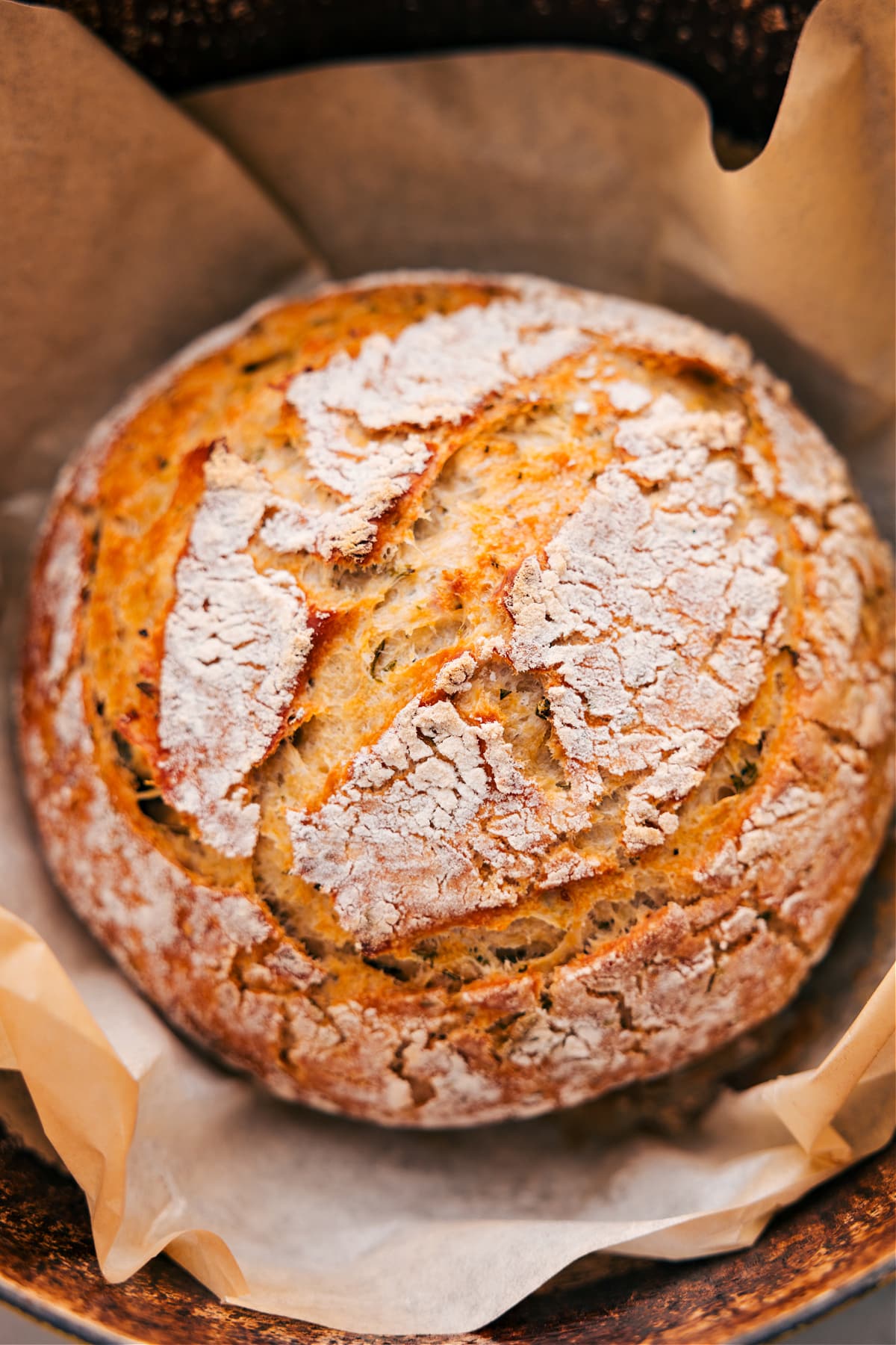 No-knead herb bread, fresh out of the oven in its pot.