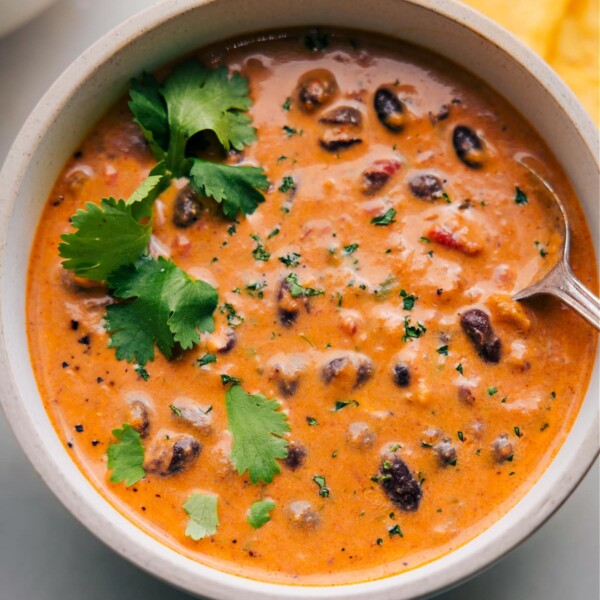 Overhead view of a bowl filled with Pumpkin Black Bean Soup, ready to be savored.