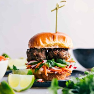 Mouth-watering slider brimming with succulent banh mi meatballs and crisp vegetables, fully assembled and ready to delight.