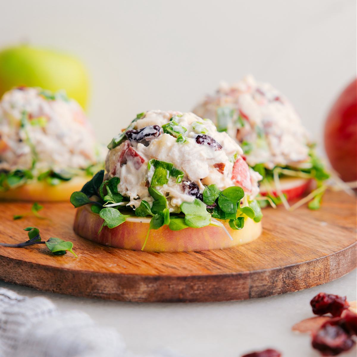 Chicken salad served on an apple.