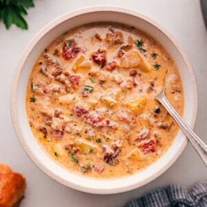 A bowl filled with the completed recipe, packed full of flavor, making it a hearty dish perfect for enjoying on a cold night.