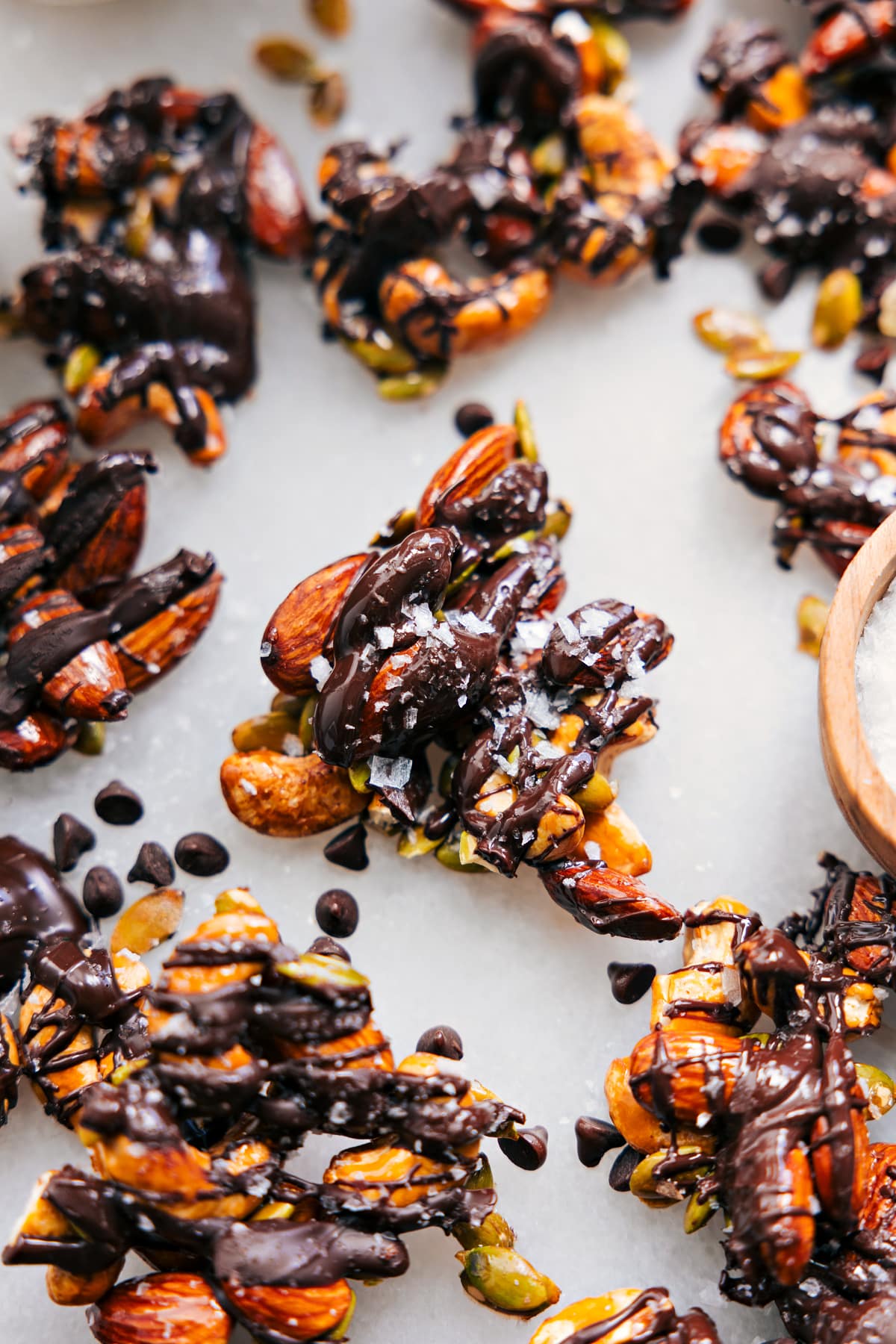 The healthy nut bark broken up in little pieces for a quick and delicious snack.