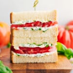 Tomato Sandwich stacked on top of each other showing the delicious inside.